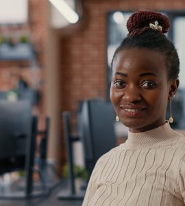 Portrait of smiling african american software developer looking at camera in artificial intelligence development agency. Confident programer posing next to colleagues working in big data office. SSUCv3H4sIAAAAAAAACnRTu47bMBDsA+QfDNVHgKT4TBukTpMuSLFckrbuZNHQ44LD4f49K8lyWCSddnY4O/vQ++dPp1MTYOqw+XJ6XyOKu75fpnmEuSsDwfzpjo9piGmskdexNbwGUuzmMnbQ12CAGS8DXBOBw9L3K/yxJZtphnmZ0rRWv0MIczqTxg4+JHaLP/f4dCS2JL2gVPMjUZXSl/Nb81RlpyWs2a/lelvmNE7Nkdvr/Ufse3hOOE//UvrWU2YsQ4eV1v7x62gZzmnAt62rqtsx9Qn2bu+NNNI5J9sITGYEpoQWzEkRGTilUAZsrcfDRBNFNkgcprWQTEUZGKjkGY9WZSFCNpE/yBZ4CpJnlqJ2TGXpSRQk80nIANkYJ9yD7HybtULDAkRFNrImZZGZFNJ6G4Kxyj7IyWaJMgomW0+edcoM0JBn76MIMoGL4a8NjVy25BkM50xhUszlFpnw1nqP3GmpH2QRLOeaKGiQyMIBC8lwFgxokEklru02833Qzctv2ui1vh5YYleqw3ktCP1KaKs93MYOu+FcPSvzZbvs4xmWZZjHdYHNw1xfyg1Cv15xJs104BeYJqLHA68KIf1H5VrVGcq8rf+u2kQ69jUUrXSG5qSd87Llios7Yf9BLh3pbHYOIYrxpYt1693qoFHR2IS5ZV6uI/RZMrAgGM9BGsd90MHTCD/+AAAA//8DAIREWED7AwAA
